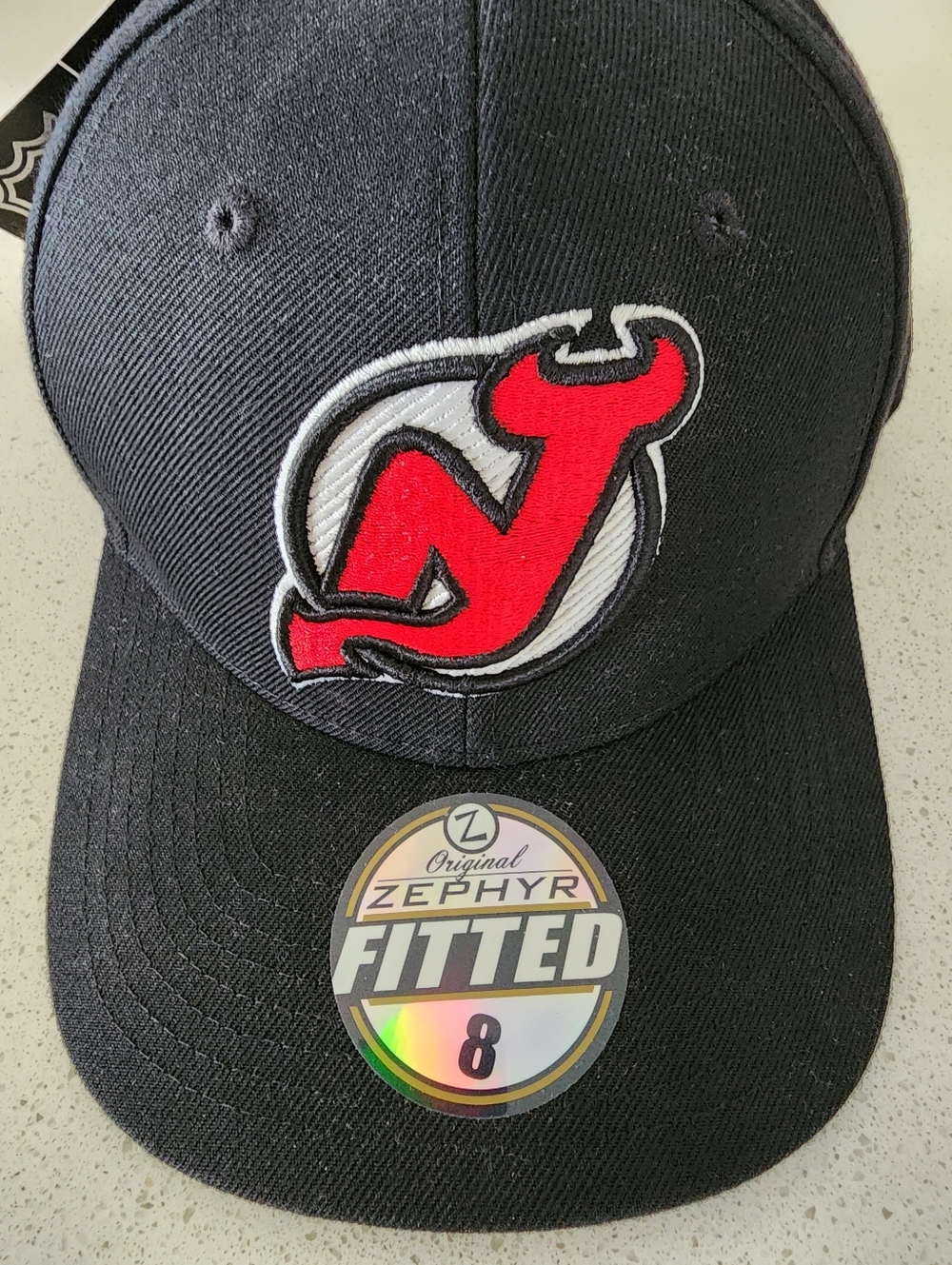 Zephyr Black New Jersey Devils Fitted Cap with Red & White Emblem, Size 8